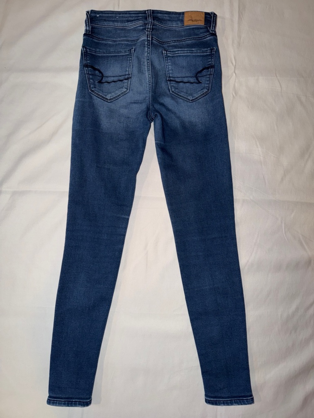 American Eagle Outfitters Blue Skinny Jeans with Back Pocket Wave Stitch - Picture 11 of 11